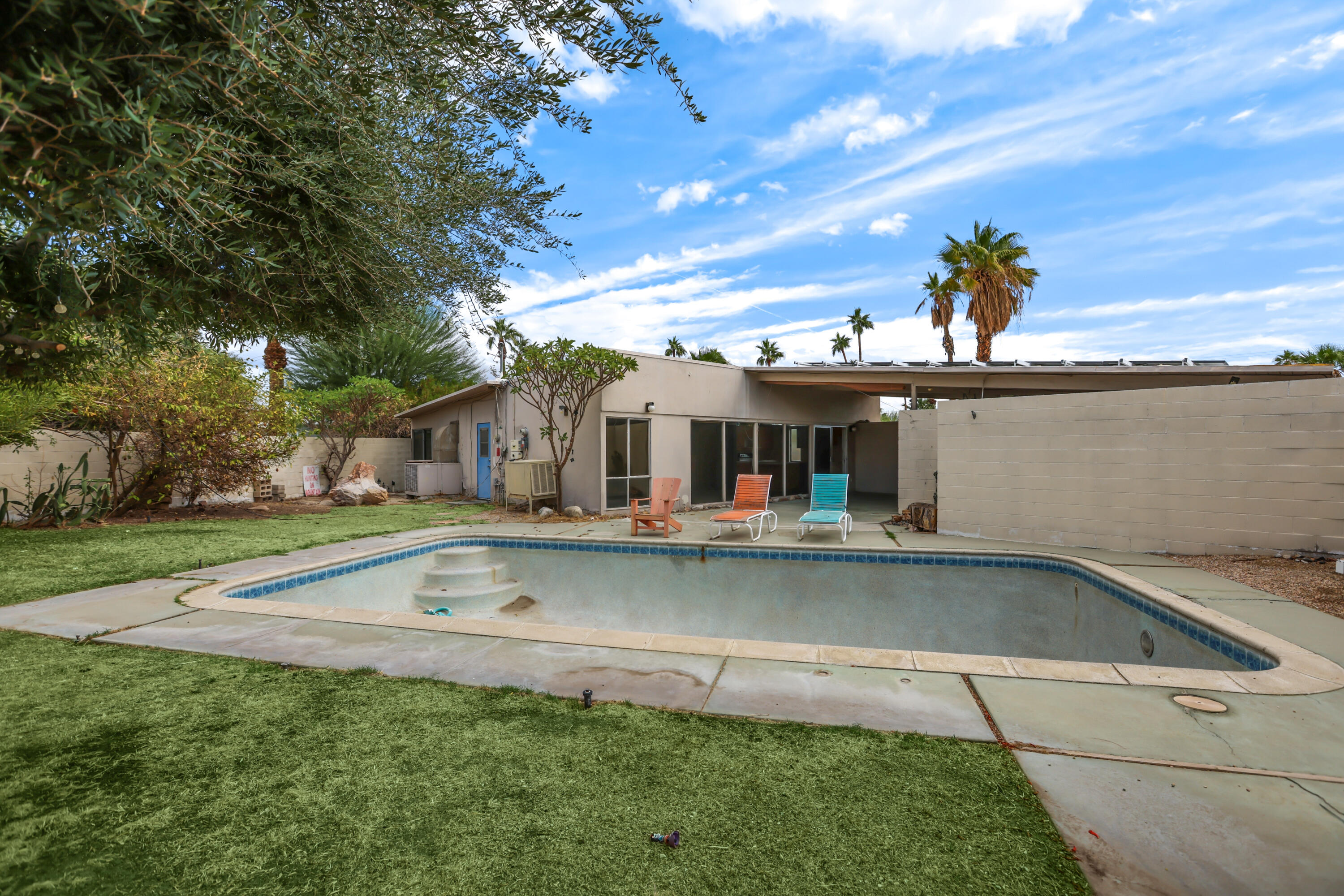 2839 North Davis Way Palm Springs, CA 92262 - Photo 26 of 29 a view of a house with pool and a yard