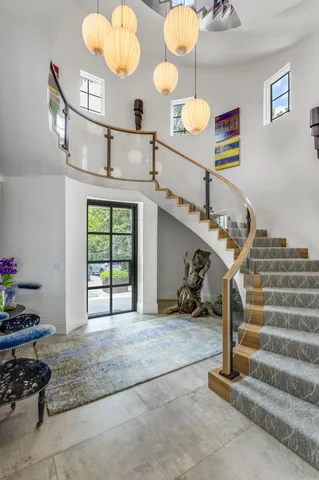 a living room with furniture and a bathtub