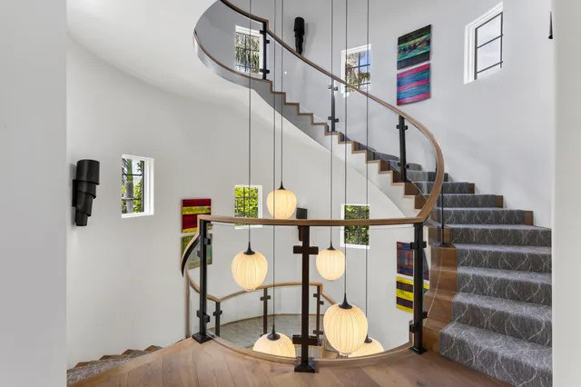 a bedroom with furniture and windows