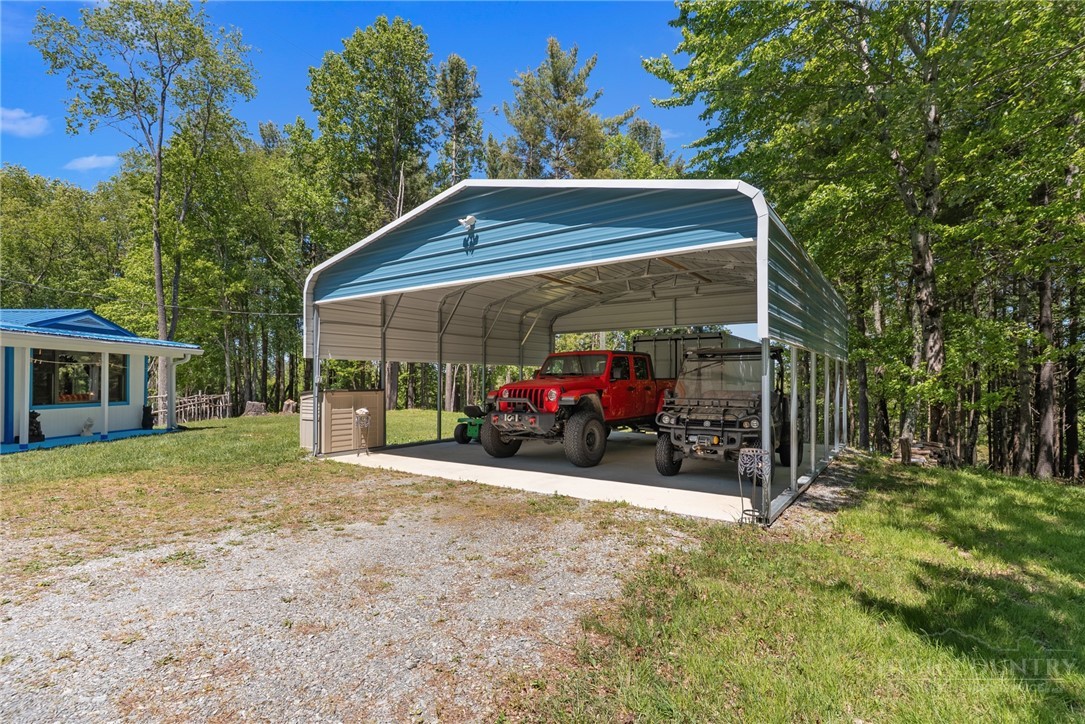 154 Folger Road Sparta, NC 28675 - Photo 24 of 37 a view of a car garage