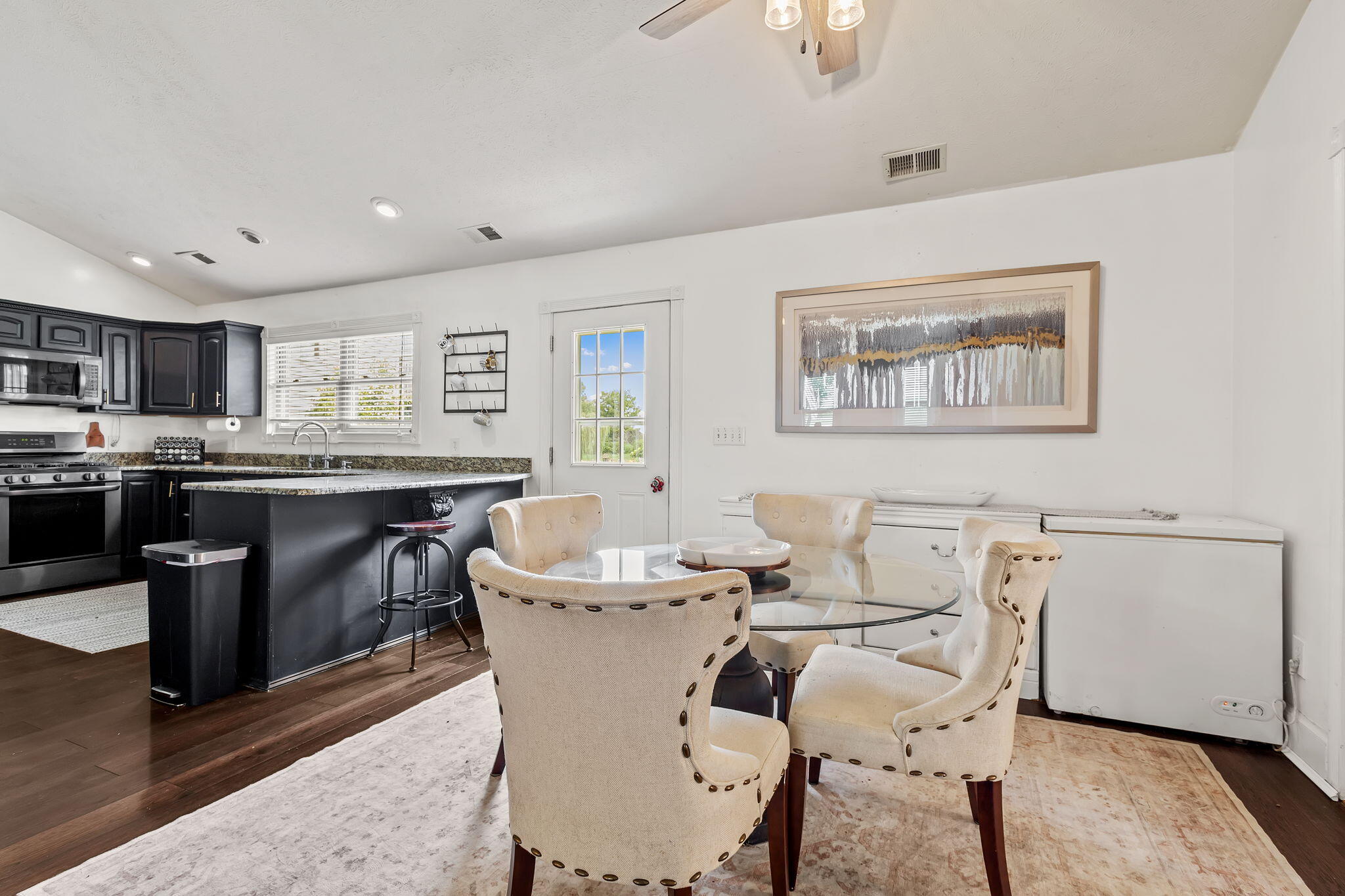 4381 Highway 231 Rensselaer, IN 47978 - Photo 11 of 30 a view of a dining room with furniture and wooden floor