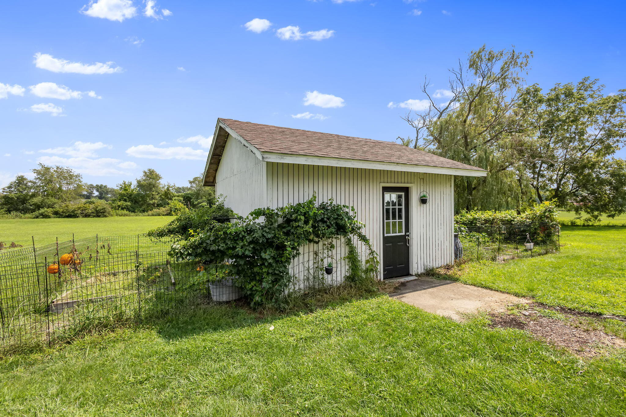 4381 Highway 231 Rensselaer, IN 47978 - Photo 27 of 30 a front view of a house with garden
