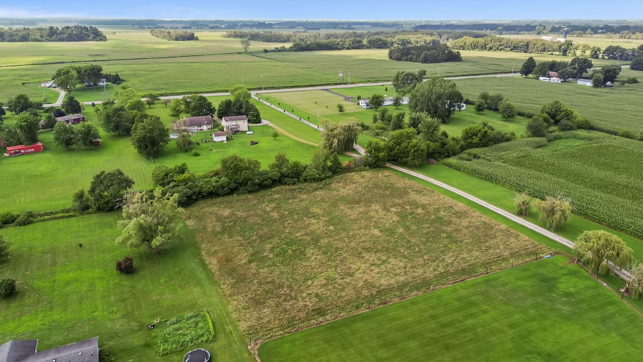 4381 Highway 231 Rensselaer, IN 47978 - Photo 3 of 30 a view of a lake with a yard
