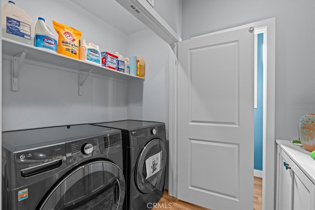 42 Concepcion Street Rancho Mission Viejo, CA 92694 - Photo 18 of 36 a utility room with dryer and washer
