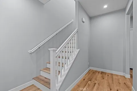 a view of entryway with wooden floor