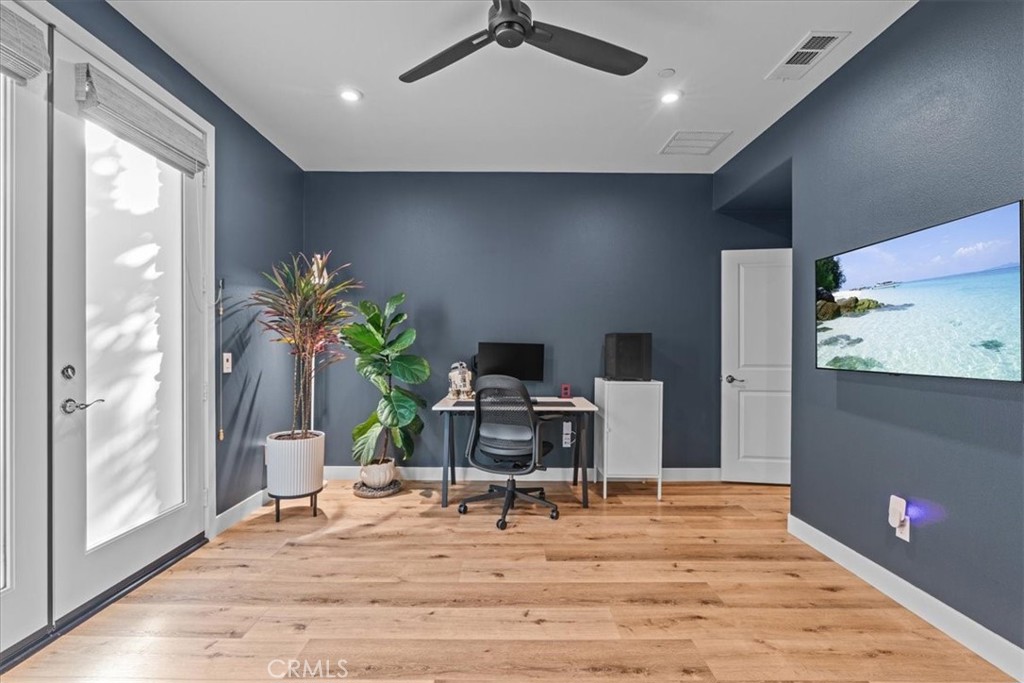 42 Concepcion Street Rancho Mission Viejo, CA 92694 - Photo 20 of 36 a living room with furniture and a potted plant