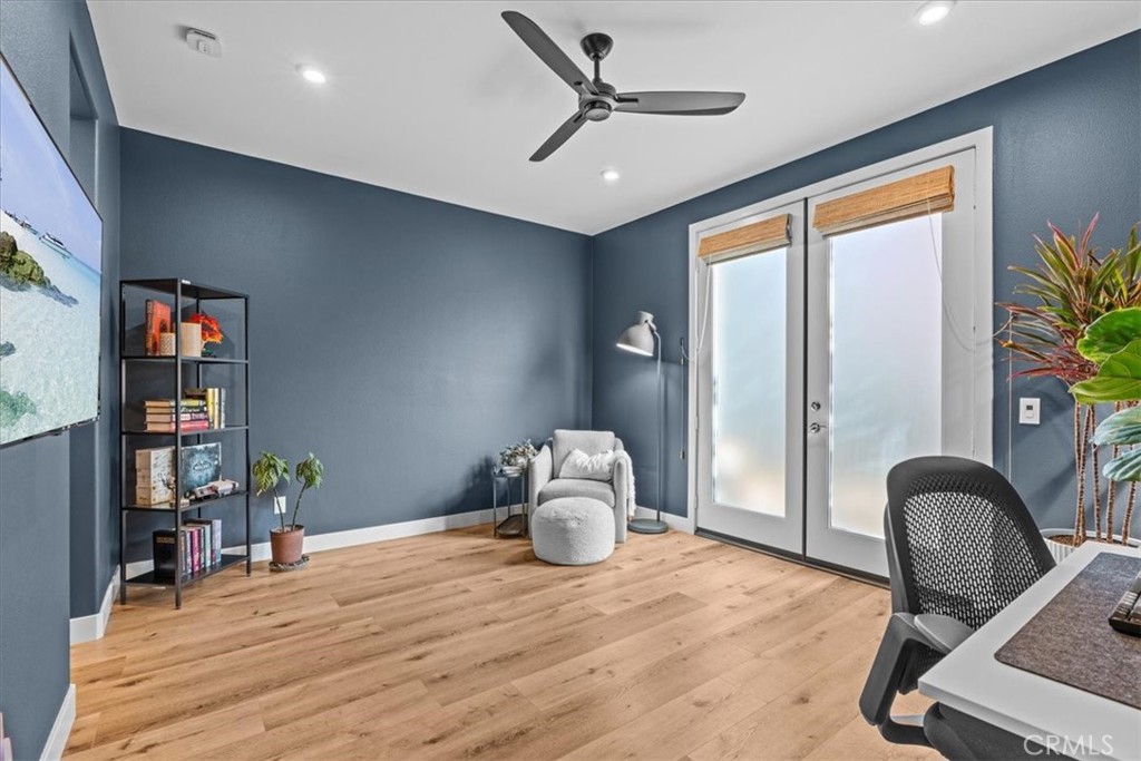 42 Concepcion Street Rancho Mission Viejo, CA 92694 - Photo 21 of 36 a workspace with furniture window and wooden floor