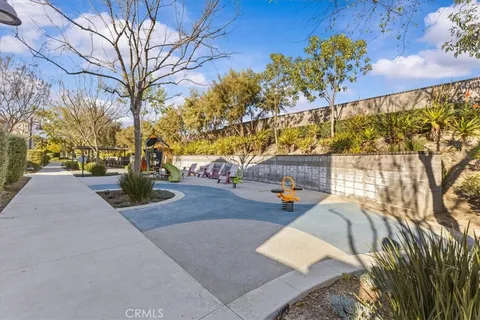 a living room view of a room with gym equipment