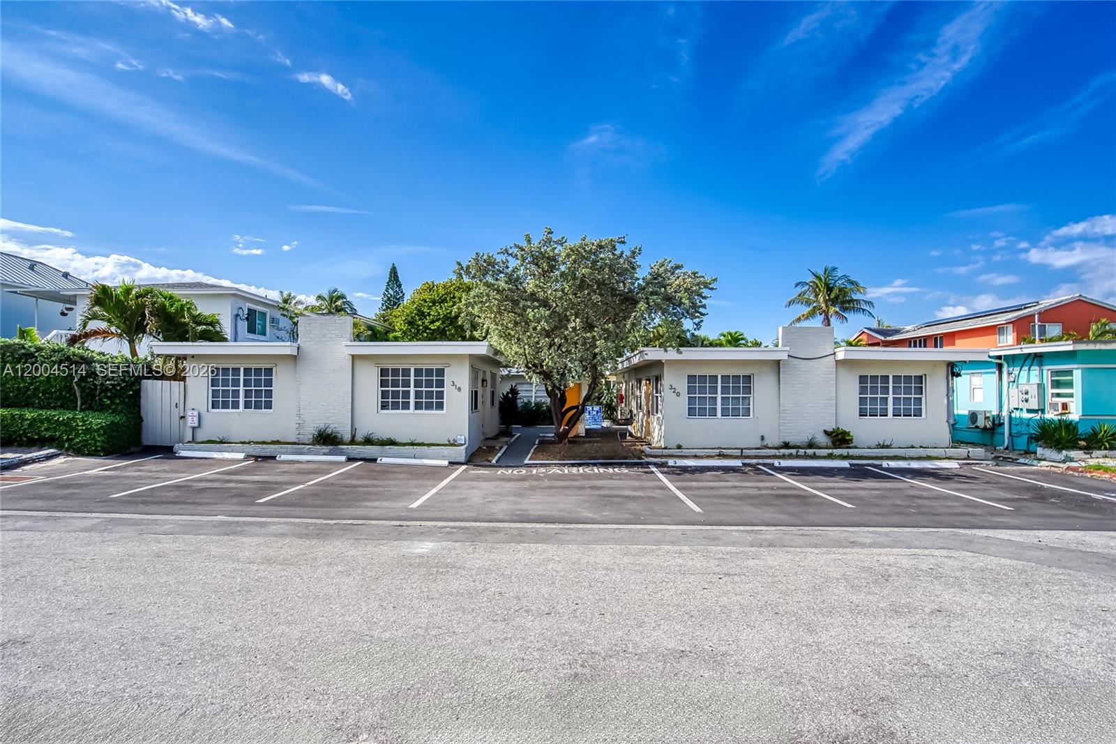 318 Walnut Street Hollywood, FL 33019 - Photo 6 of 15 front view of house with a street