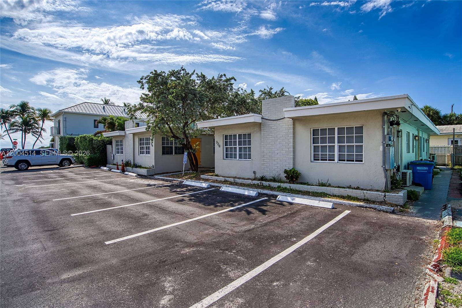 318 Walnut Street Hollywood, FL 33019 - Photo 9 of 15 a front view of a house with yard