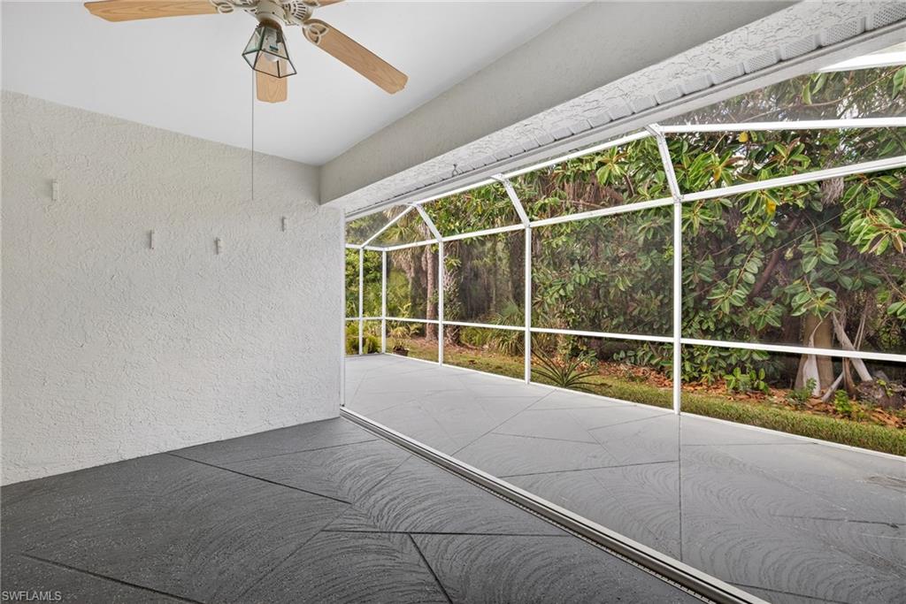6316 Shadowood Circle Naples, FL 34112 - Photo 20 of 26 a view of an empty room with a window