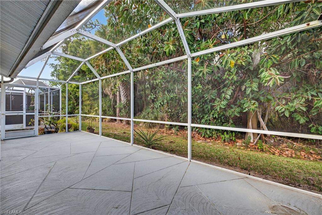6316 Shadowood Circle Naples, FL 34112 - Photo 21 of 26 a view of a tennis court