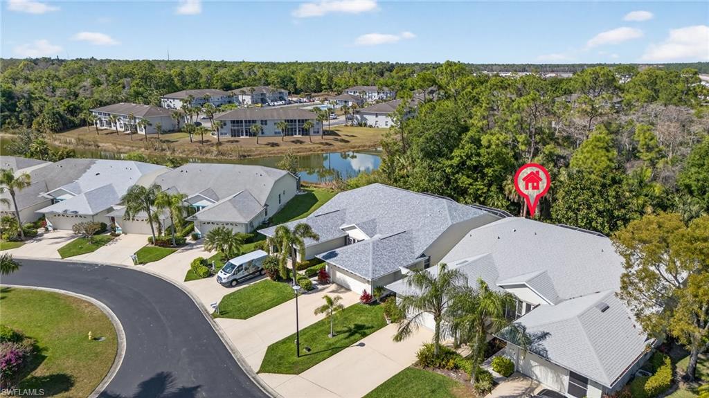 6316 Shadowood Circle Naples, FL 34112 - Photo 23 of 26 an aerial view of a house with a swimming pool yard and outdoor seating