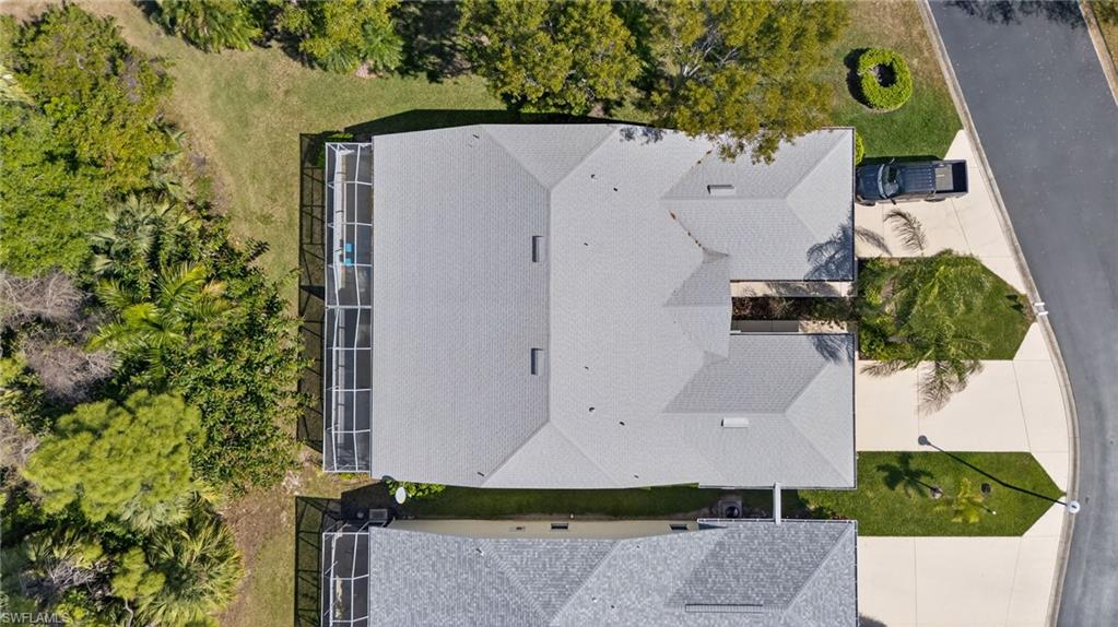 6316 Shadowood Circle Naples, FL 34112 - Photo 24 of 26 an aerial view of a house with a yard