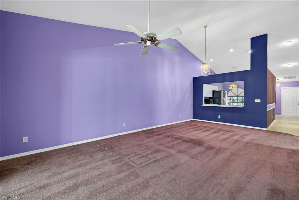 6316 Shadowood Circle Naples, FL 34112 - Photo 6 of 26 a view of an empty room with a fan