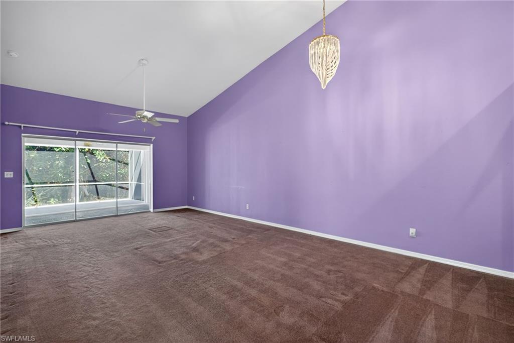 6316 Shadowood Circle Naples, FL 34112 - Photo 7 of 26 a view of an empty room with a window