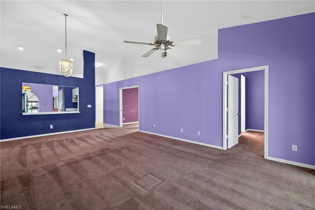 6316 Shadowood Circle Naples, FL 34112 - Photo 9 of 26 a view of a livingroom with a ceiling fan