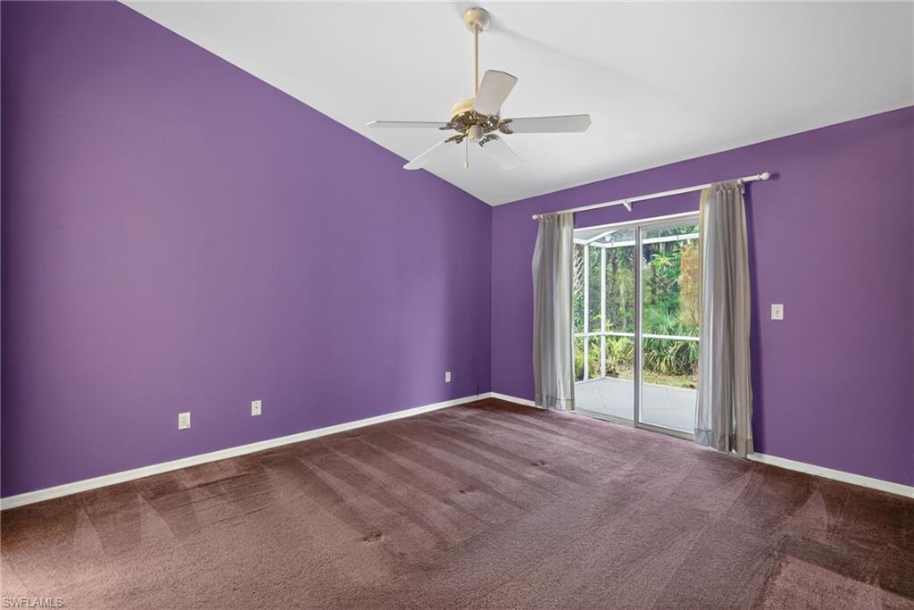 6316 Shadowood Circle Naples, FL 34112 - Photo 10 of 26 a view of an empty room with a window