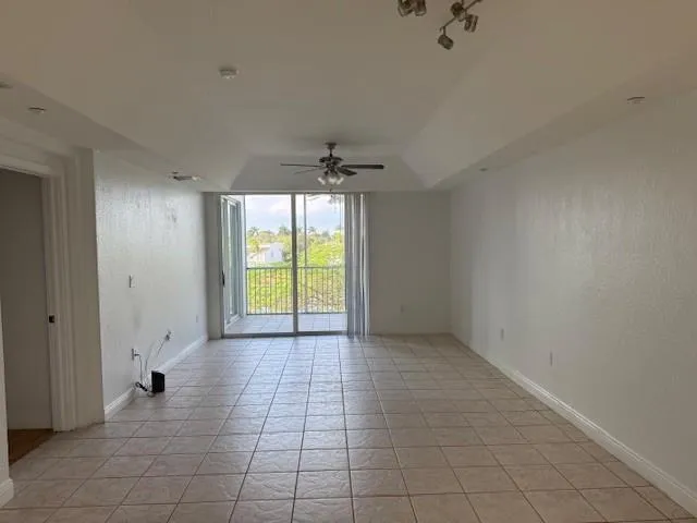 a view of an empty room and window