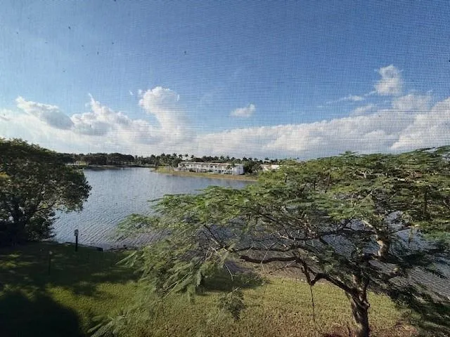 an empty room with sliding glass door
