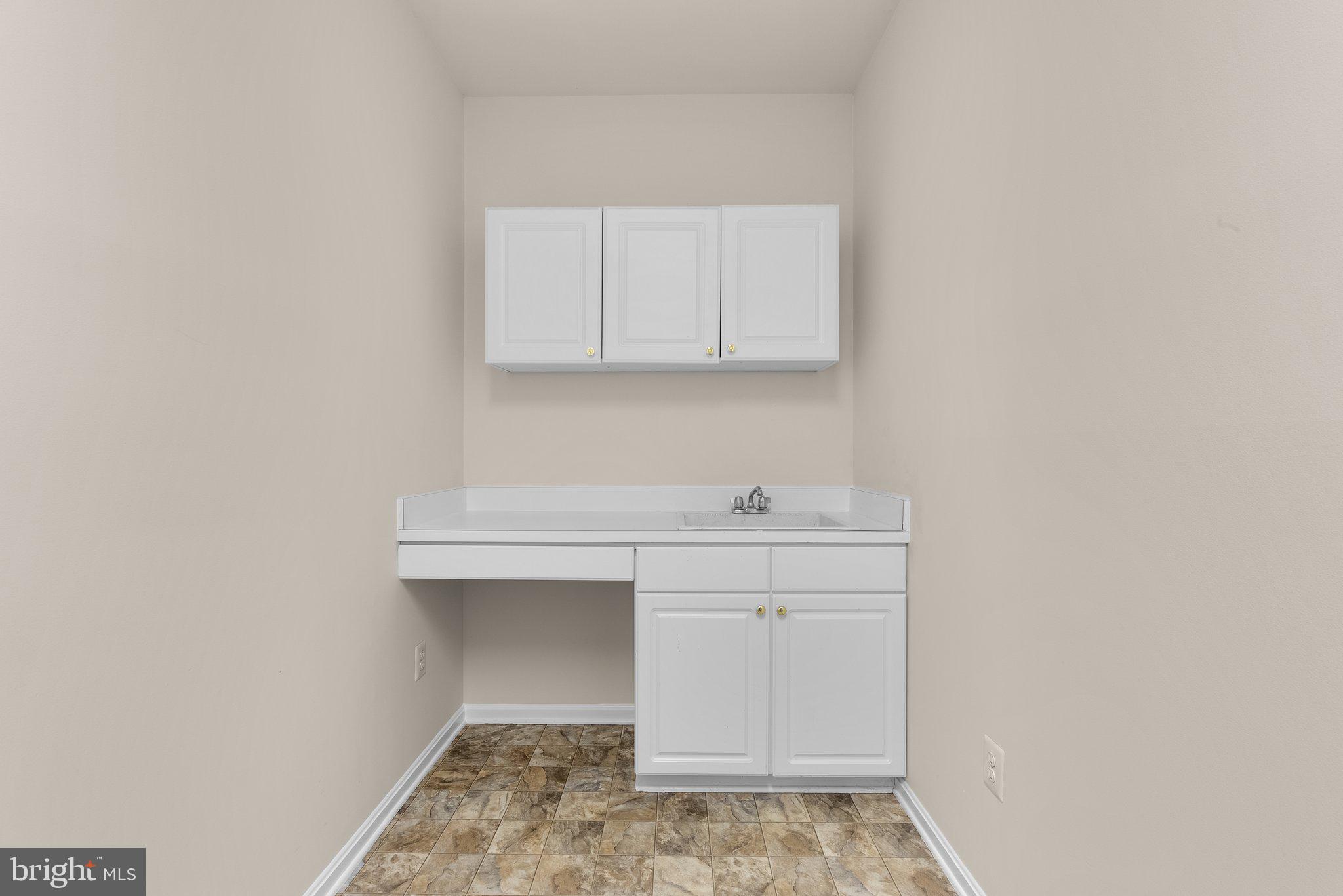 10411 Wetherburn Road Woodstock, MD 21163 - Photo 25 of 56 Laundry Room