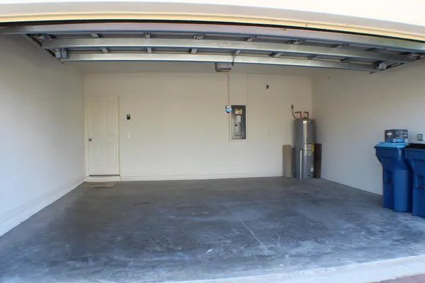 a view of a room with a wooden floor