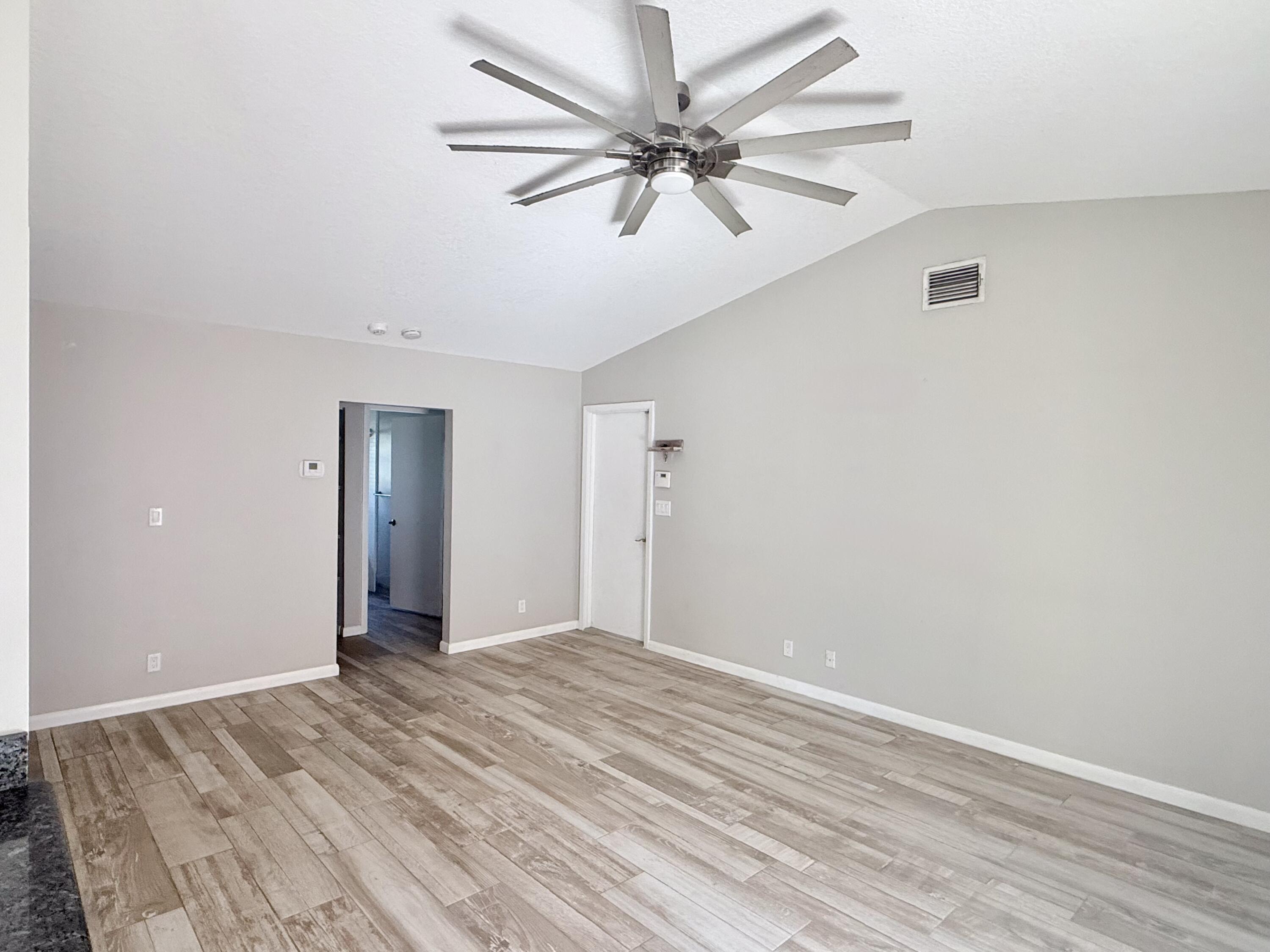 82 Sandpiper Way Boynton Beach, FL 33436 - Photo 10 of 24 a view of room with ceiling fan