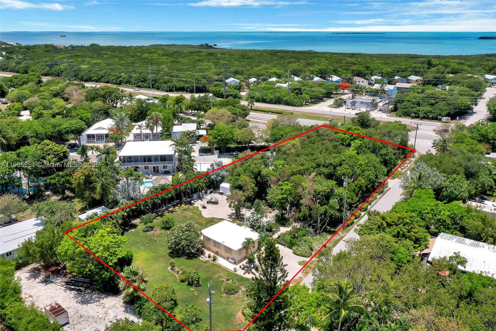 306 Lime Street Key Largo, FL 33037 - Photo 2 of 37 a view of city and ocean