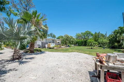 a front view of a house having yard