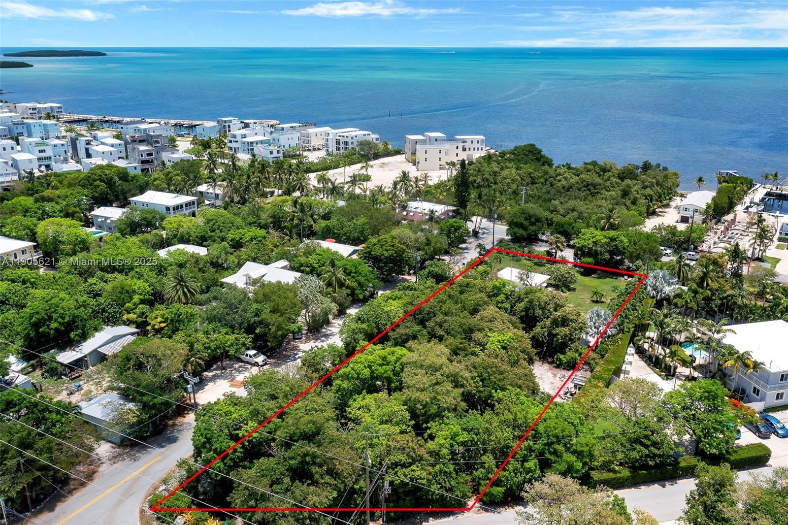 306 Lime Street Key Largo, FL 33037 - Photo 8 of 37 a view of a lake with a city