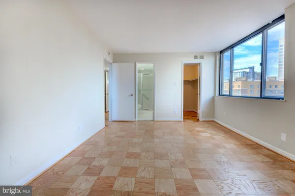 an empty room with windows