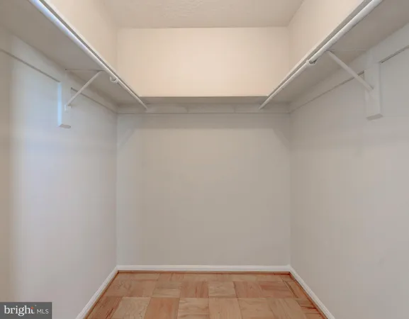 a view of an empty walk in closet