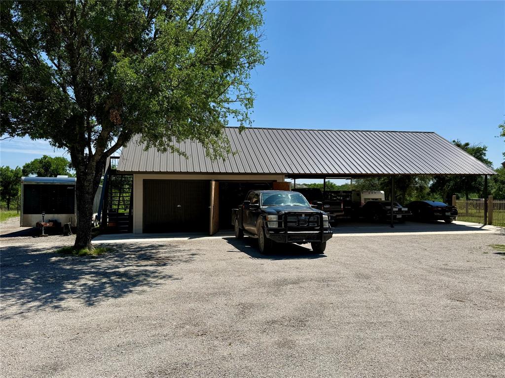 2007 Deep Water Road May, TX 76857 - Photo 22 of 40 a car parked in front of a house