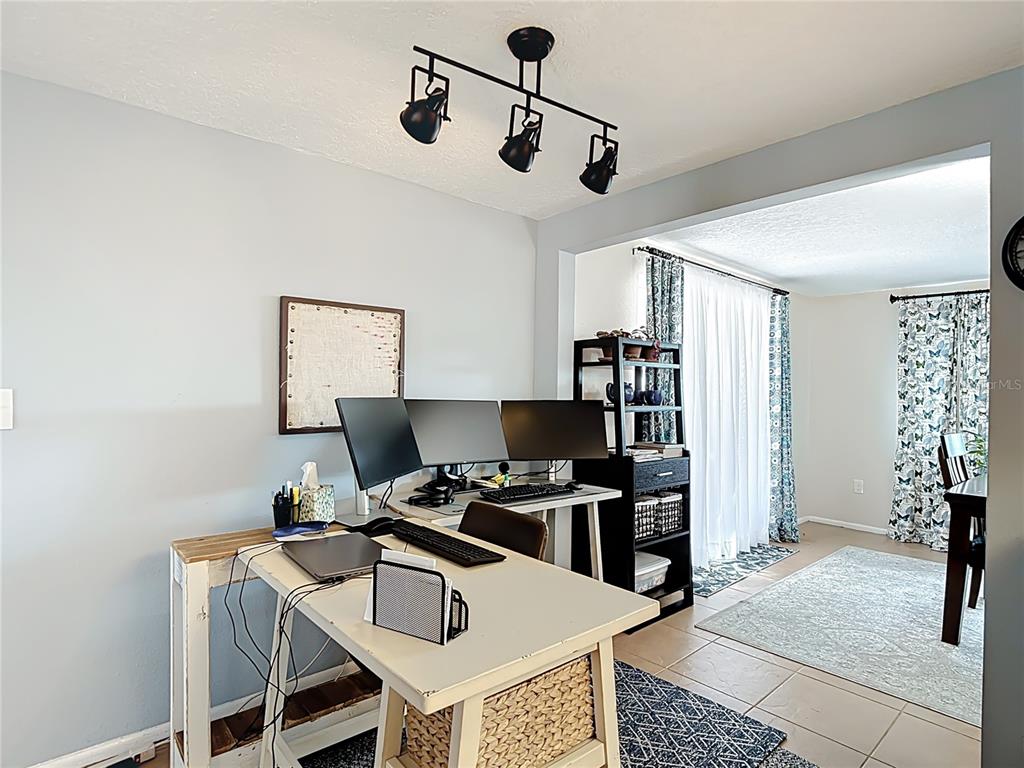 9420 Cochise Lane Port Richey, FL 34668 - Photo 12 of 47 a view of a workspace with furniture