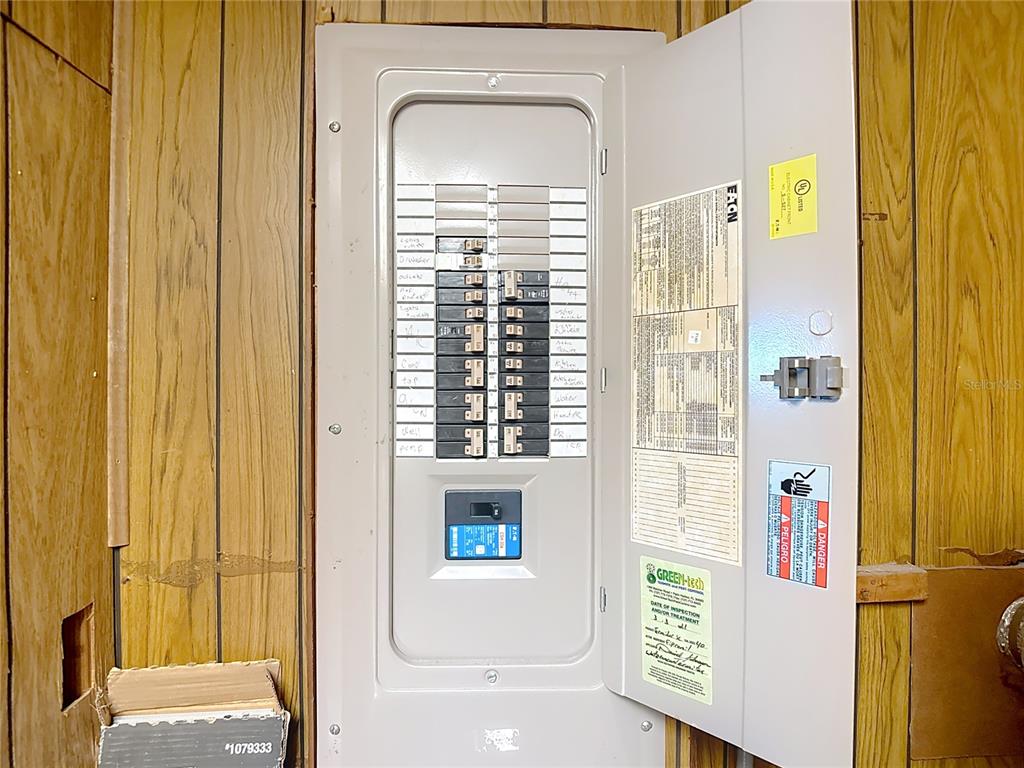 9420 Cochise Lane Port Richey, FL 34668 - Photo 34 of 47 a view of a bathroom with a shower curtain