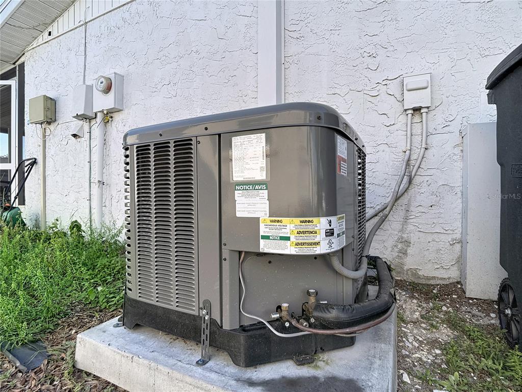 9420 Cochise Lane Port Richey, FL 34668 - Photo 35 of 47 a front view of a house with outdoor seating
