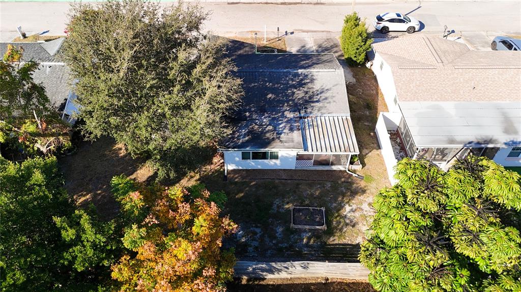 9420 Cochise Lane Port Richey, FL 34668 - Photo 40 of 47 a front view of a house with a yard