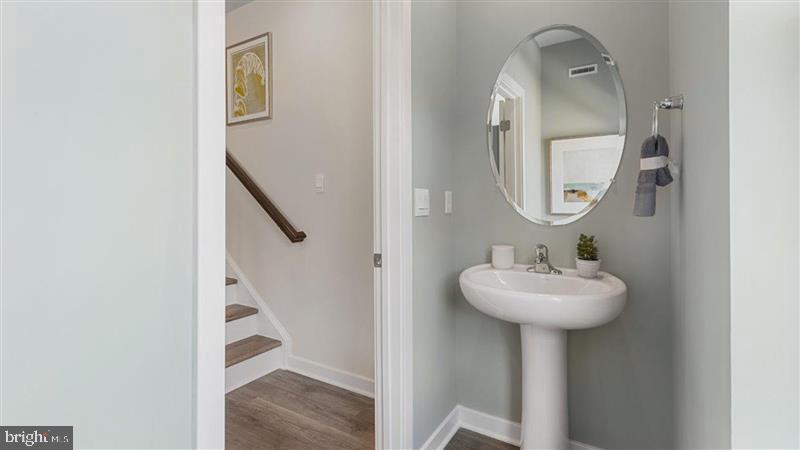 592 Swamp Creek Road Boyertown, PA 19512 - Photo 12 of 26 a bathroom with a sink a mirror a vanity and bathtub