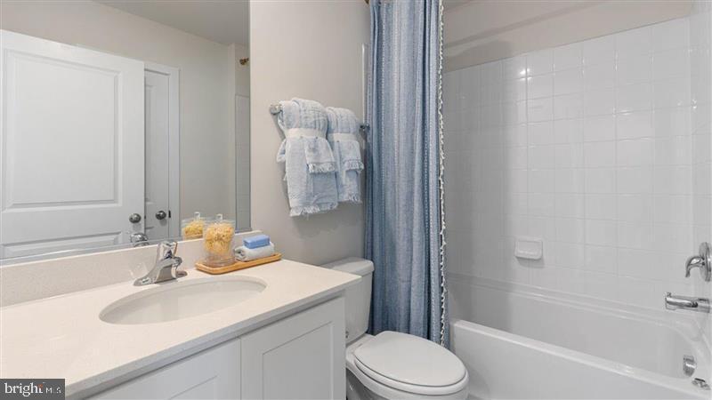 592 Swamp Creek Road Boyertown, PA 19512 - Photo 21 of 26 a bathroom with a sink toilet and shower