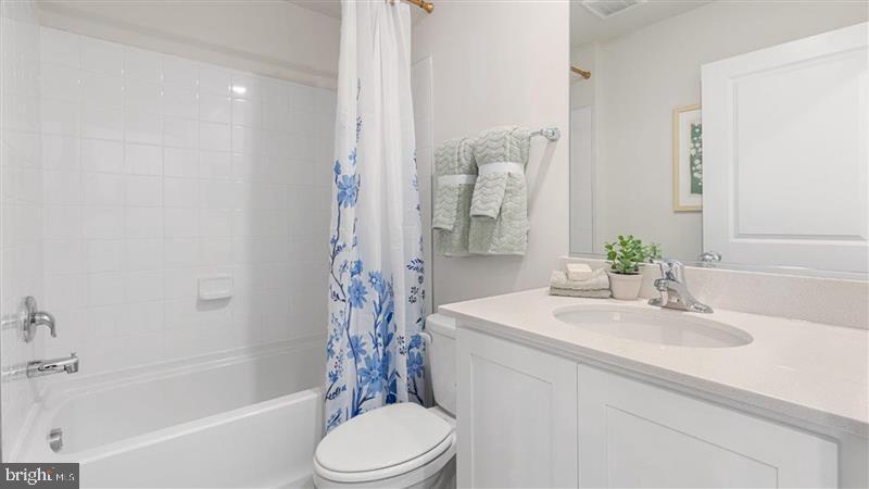 592 Swamp Creek Road Boyertown, PA 19512 - Photo 26 of 26 a bathroom with a sink toilet and shower