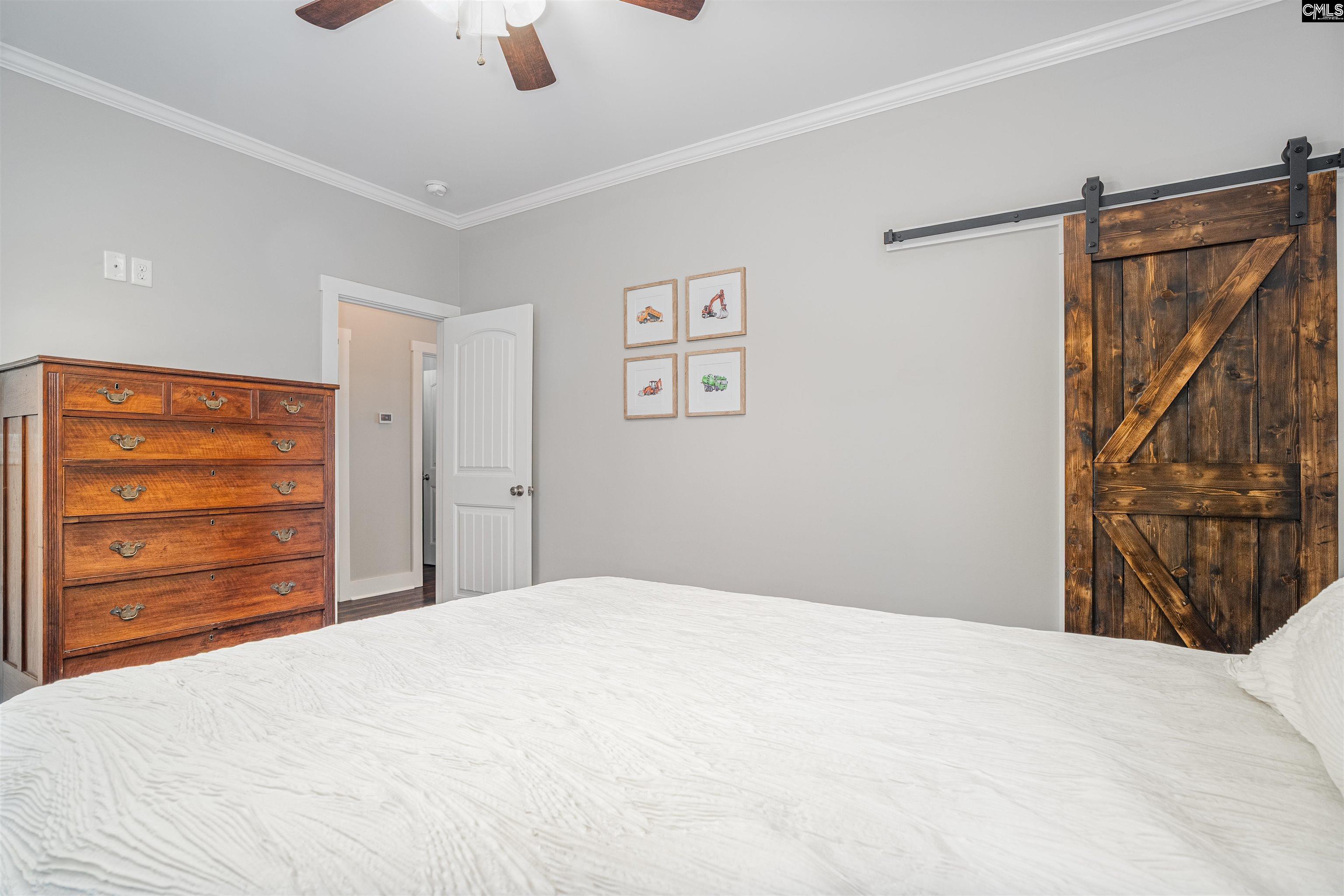 649 Sandbar Road Chapin, SC 29036 - Photo 17 of 40 a bedroom with a bed and a closet