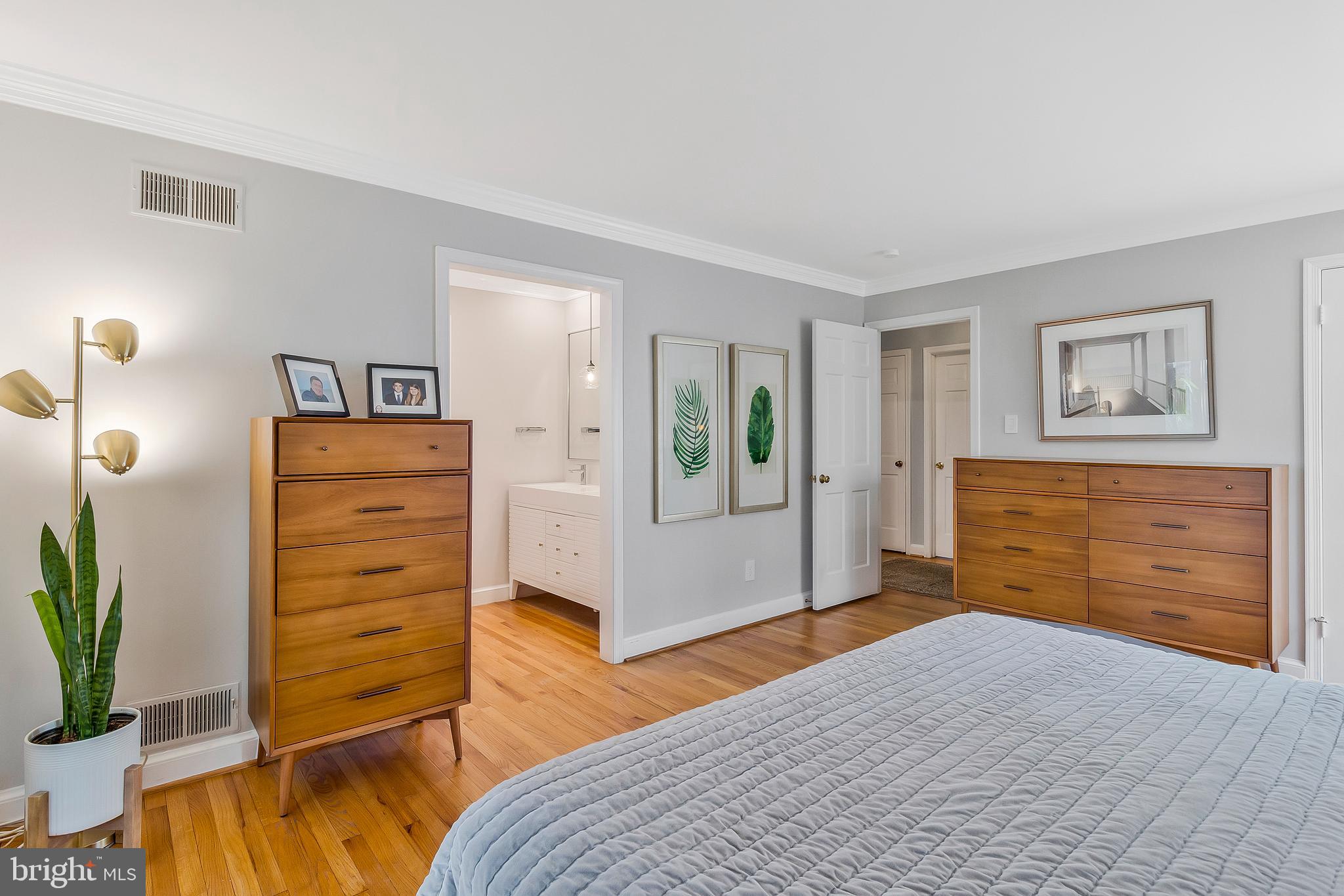 2812 Greenvale Street Chevy Chase, MD 20815 - Photo 18 of 27 a bedroom with a bed and furniture