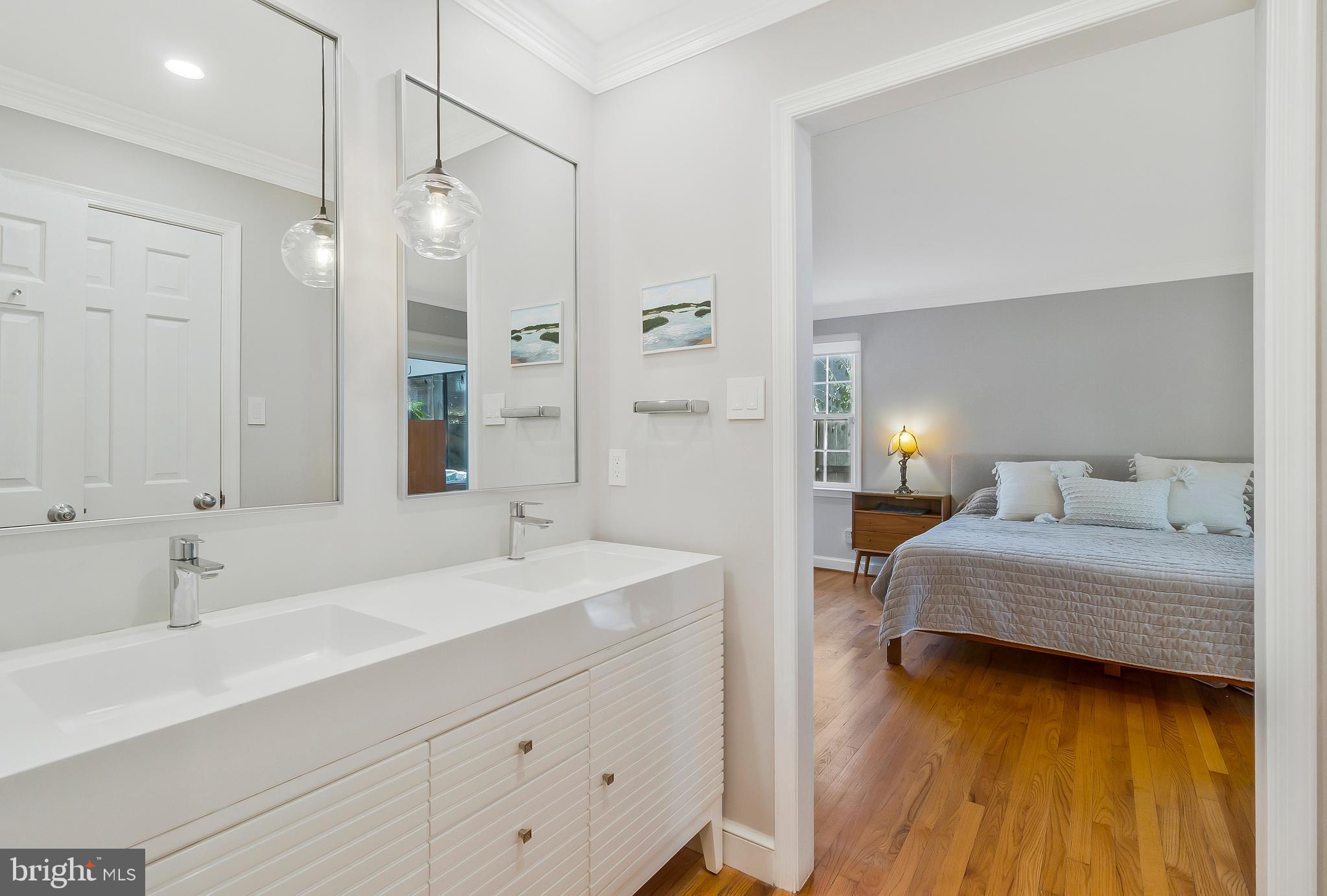 2812 Greenvale Street Chevy Chase, MD 20815 - Photo 21 of 27 a spacious bathroom with double vanity and a mirror