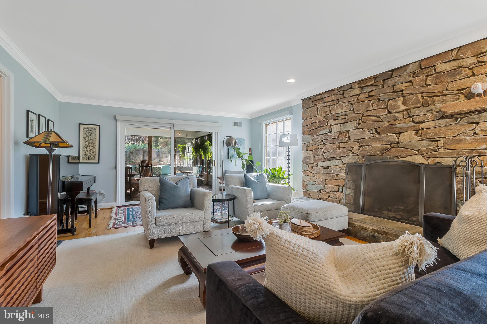 2812 Greenvale Street Chevy Chase, MD 20815 - Photo 7 of 27 a living room with furniture and a fireplace
