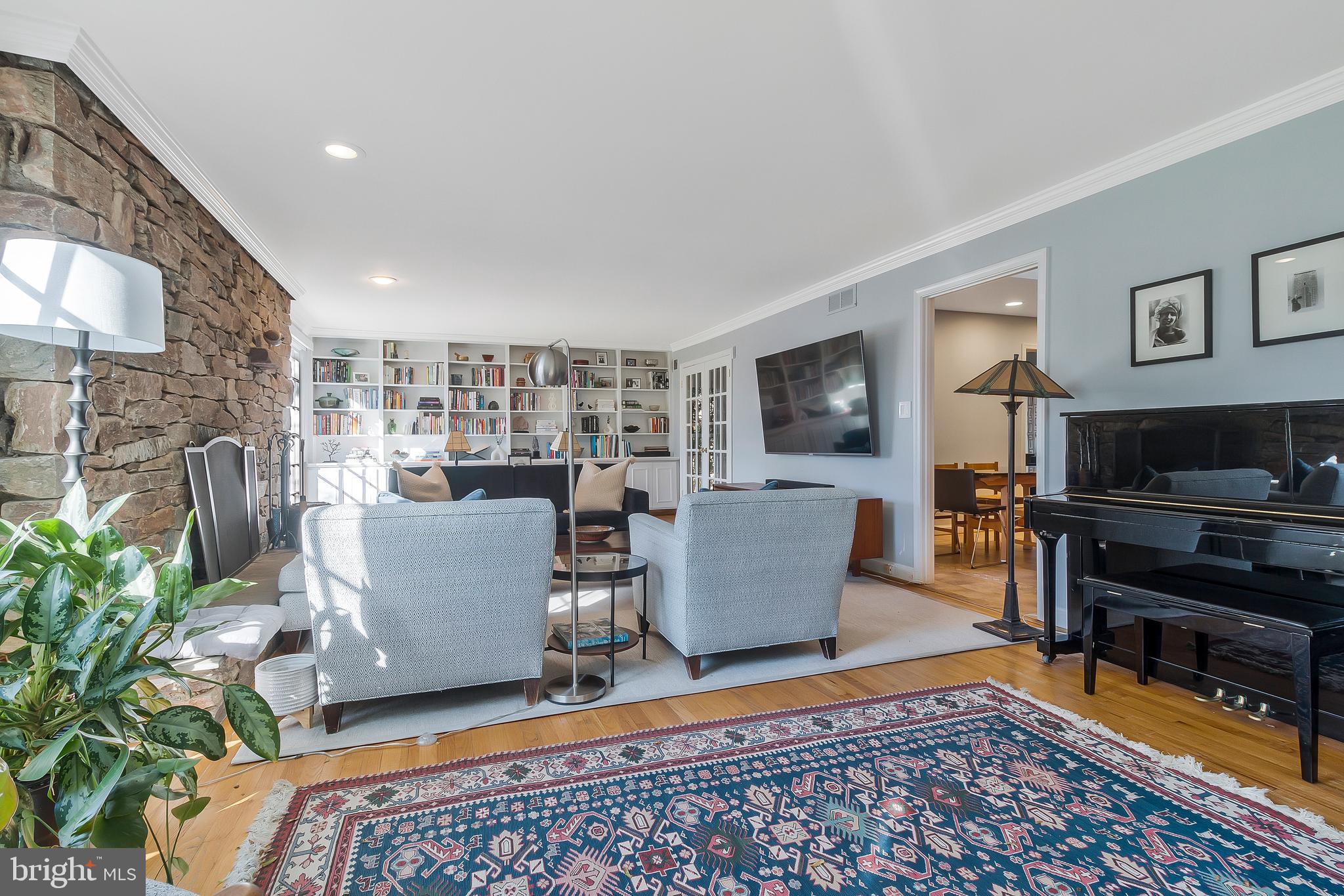2812 Greenvale Street Chevy Chase, MD 20815 - Photo 8 of 27 a living room with furniture and a flat screen tv