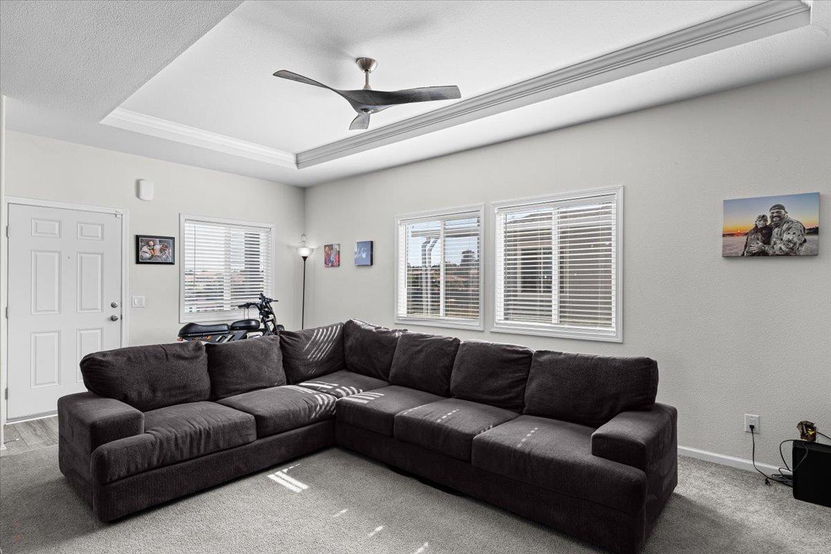 4399 Aplicella Court, Unit 75 Manteca, CA 95337 - Photo 11 of 30 a living room with furniture and a large window