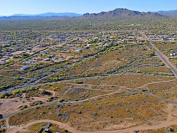 a view of an ocean and a mountain