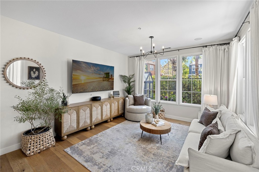 36 Tuberose Street Ladera Ranch, CA 92694 - Photo 19 of 39 a living room with furniture and a flat screen tv