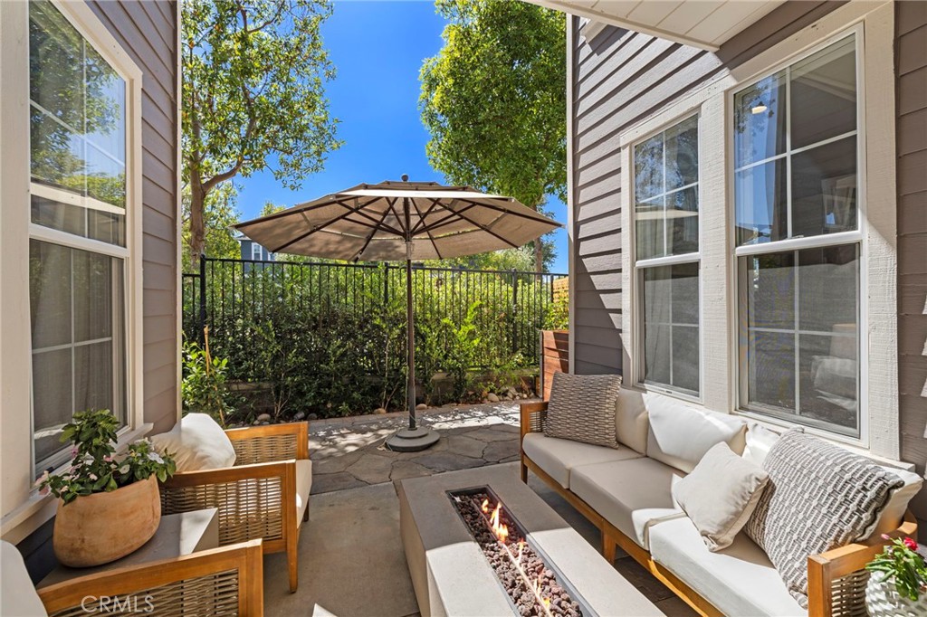 36 Tuberose Street Ladera Ranch, CA 92694 - Photo 24 of 39 a balcony with furniture and a potted plant