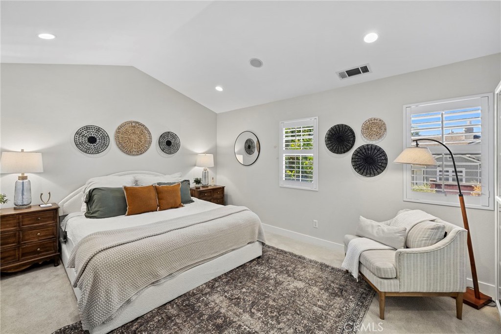 36 Tuberose Street Ladera Ranch, CA 92694 - Photo 25 of 39 a bedroom with a bed and a painting on the wall